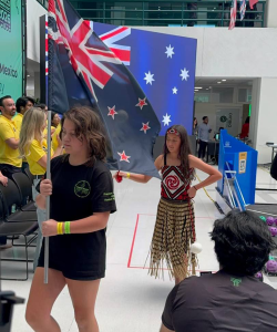 Harper and Astrid represented New Zealand at First Tech Challenge in Mexico, Harper wearing our kapa haka uniform proudly, Astrid holding the New Zealand Flag in the opening ceremony.